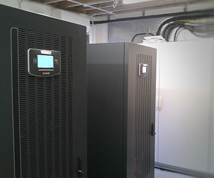An engineer finishing an electrical installation as part of a UPS install